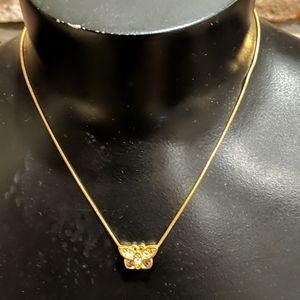 Gold and jeweled butterfly necklace